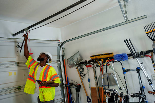 Professional Garage Door Panel Replacement technician working in Raymondville, TX
